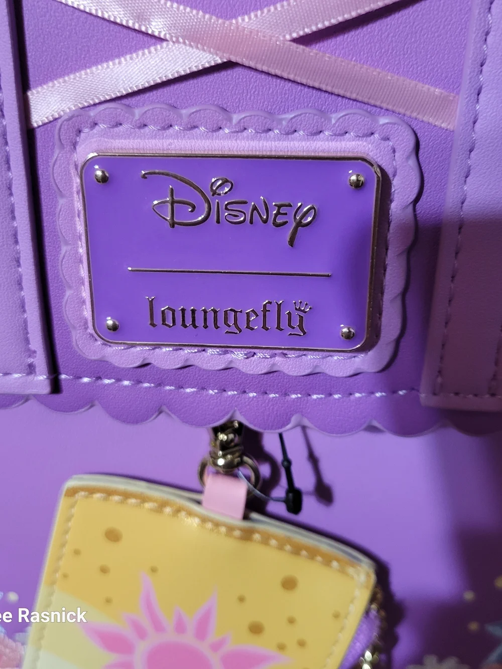 Loungefly Tangled Rapunzel Exclusive Floral Flap Mini Backpack with Coin Bag.